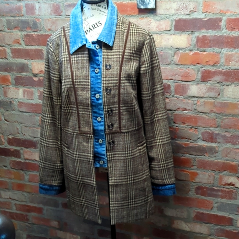 Three quarter length riding style jacket.